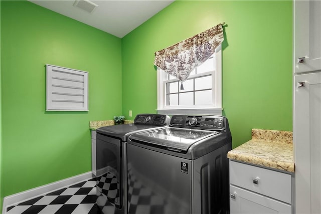 1272 Mcewen Rd, Cecil, PA 15317 - laundry area featuring independent washer and dryer, cabinet space, tile patterned floors, and baseboards