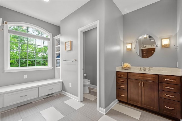 1272 Mcewen Rd, Cecil, PA 15317 - bathroom featuring vanity, toilet, and baseboards