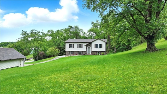 406 Maple Dr, Irwin, PA 15617 - view of front of home with a front yard and view of scattered trees