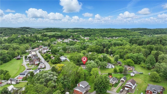 406 Maple Dr, Irwin, PA 15617 - aerial view of property and surrounding area with a forest and nearby suburban area
