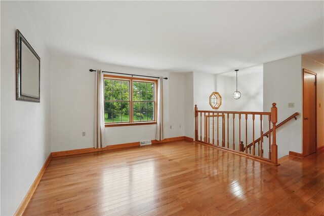 406 Maple Dr, Irwin, PA 15617 - spare room featuring light wood finished floors and baseboards