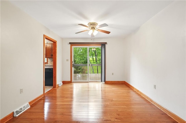 406 Maple Dr, Irwin, PA 15617 - empty room featuring ceiling fan, light wood finished floors, and baseboards