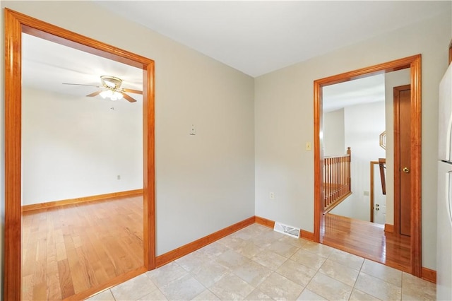 406 Maple Dr, Irwin, PA 15617 - empty room featuring ceiling fan and baseboards