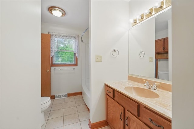 406 Maple Dr, Irwin, PA 15617 - bathroom with toilet, vanity, tile patterned floors, and bathing tub / shower combination