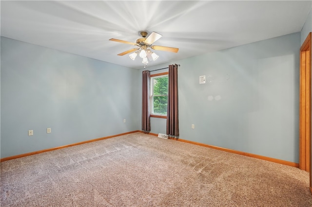 406 Maple Dr, Irwin, PA 15617 - carpeted spare room with a ceiling fan and baseboards