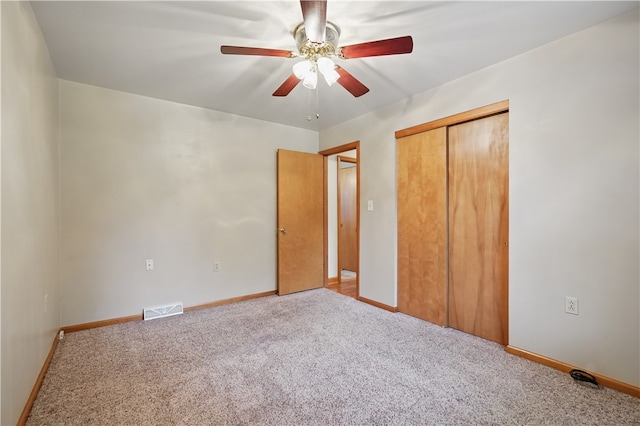 406 Maple Dr, Irwin, PA 15617 - unfurnished bedroom featuring carpet flooring, baseboards, a closet, and ceiling fan