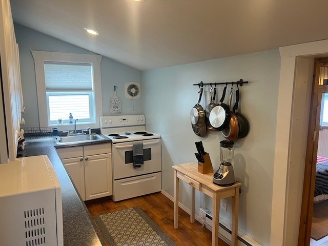 11863 Lakeview, Conneaut Lake Cra, PA 16316 - kitchen with white appliances, a sink, vaulted ceiling, dark wood-style flooring, and white cabinetry
