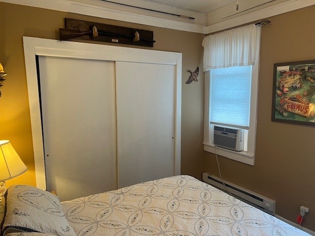 11863 Lakeview, Conneaut Lake Cra, PA 16316 - bedroom with a baseboard heating unit, a closet, and cooling unit