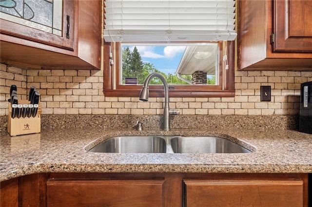 1967 Rostraver, Rostraver, PA 15012 - kitchen with a sink, backsplash, healthy amount of natural light, and light stone countertops