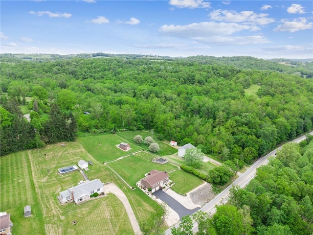 1967 Rostraver, Rostraver, PA 15012 - aerial view of property and surrounding area with a heavily wooded area