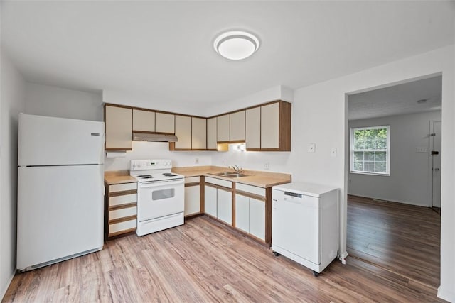 303 Laporte Ct, Cranberry Twp, PA 16066 - kitchen featuring white appliances, a sink, light countertops, light wood-style flooring, and under cabinet range hood