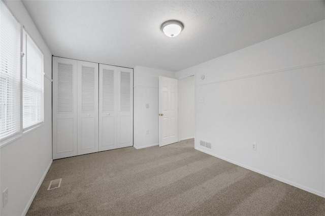 303 Laporte Ct, Cranberry Twp, PA 16066 - unfurnished bedroom featuring carpet floors and multiple windows