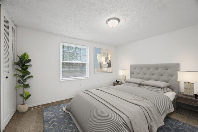 303 Laporte Ct, Cranberry Twp, PA 16066 - carpeted bedroom with a textured ceiling and baseboards