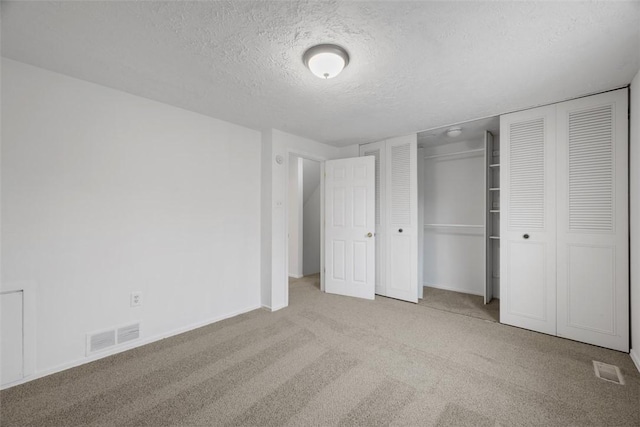 303 Laporte Ct, Cranberry Twp, PA 16066 - unfurnished bedroom featuring a textured ceiling, carpet, a closet, and baseboards