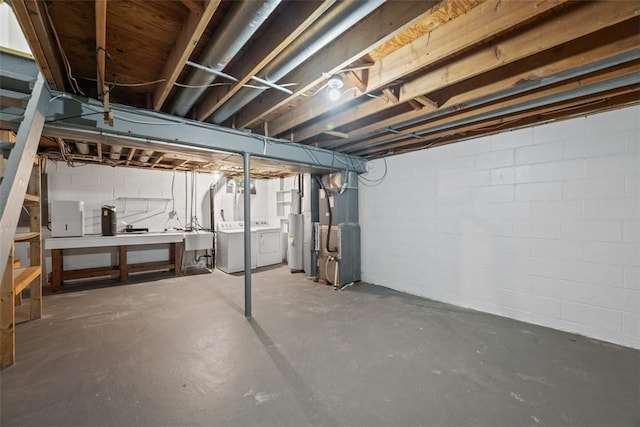 303 Laporte Ct, Cranberry Twp, PA 16066 - unfinished basement with washing machine and dryer, water heater, heating unit, a sink, and concrete block wall