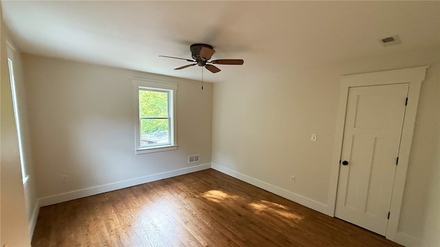 102 Green Vista Dr, Ohio Twp, PA 15237 - unfurnished room with ceiling fan and dark wood-style flooring