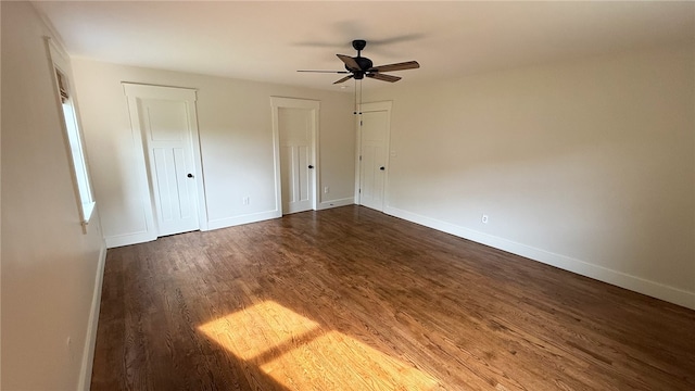 102 Green Vista Dr, Ohio Twp, PA 15237 - unfurnished bedroom featuring dark wood-style floors, multiple closets, and ceiling fan