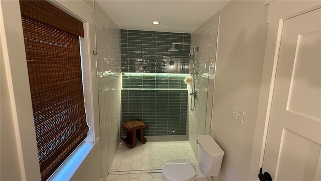 102 Green Vista Dr, Ohio Twp, PA 15237 - full bath featuring tile patterned flooring, tiled shower, recessed lighting, and tile walls