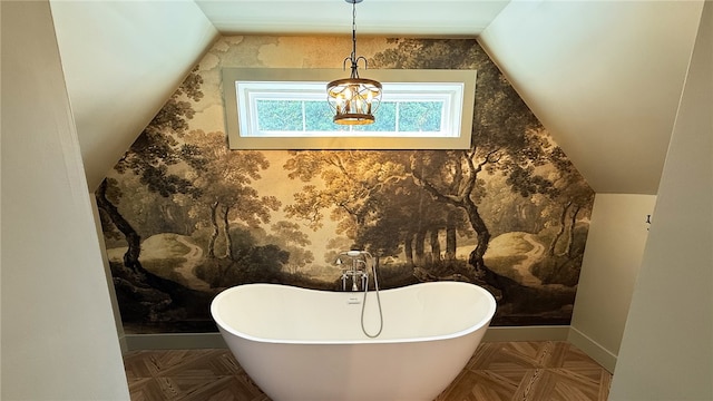 102 Green Vista Dr, Ohio Twp, PA 15237 - bathroom featuring vaulted ceiling and a freestanding tub