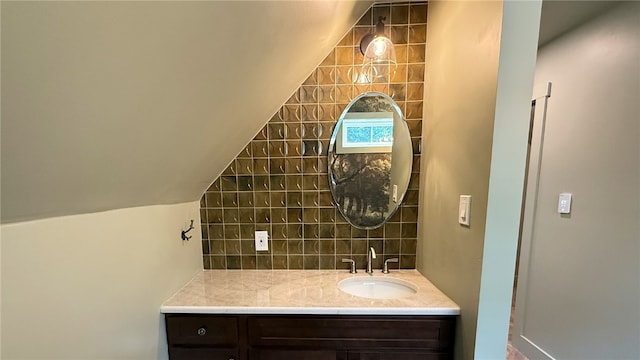 102 Green Vista Dr, Ohio Twp, PA 15237 - bathroom featuring vaulted ceiling, vanity, and backsplash