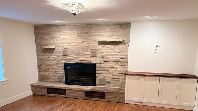102 Green Vista Dr, Ohio Twp, PA 15237 - unfurnished living room featuring a fireplace and wood finished floors