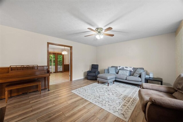 803 E Arcadia Dr, Mccandless, PA 15237 - living room with light wood finished floors and a ceiling fan