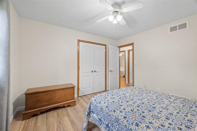 803 E Arcadia Dr, Mccandless, PA 15237 - bedroom with light wood-style flooring, baseboards, ceiling fan, and a closet