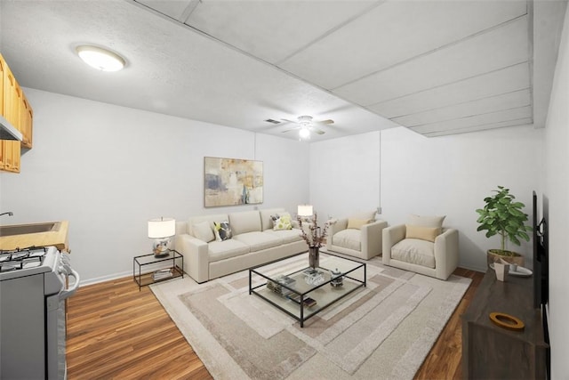 803 E Arcadia Dr, Mccandless, PA 15237 - living area with wood finished floors, ceiling fan, and baseboards