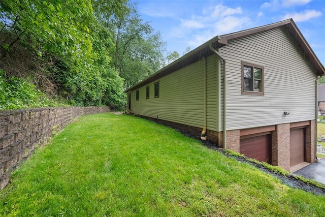 803 E Arcadia Dr, Mccandless, PA 15237 - view of property exterior featuring a garage, a lawn, and driveway
