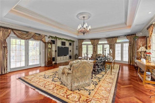 138 Presnar Dr, Neshannock Twp, PA 16105 - living room featuring a tray ceiling, a chandelier, and ornamental molding