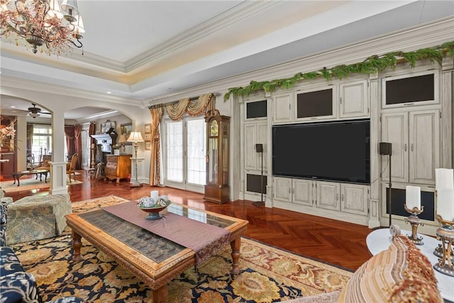 138 Presnar Dr, Neshannock Twp, PA 16105 - living area featuring arched walkways, ornate columns, ornamental molding, a chandelier, and a tray ceiling