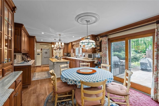 138 Presnar Dr, Neshannock Twp, PA 16105 - dining space with a chandelier, wood finished floors, recessed lighting, and ornamental molding