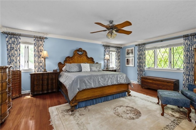 138 Presnar Dr, Neshannock Twp, PA 16105 - bedroom with hardwood / wood-style flooring, baseboards, crown molding, and a ceiling fan