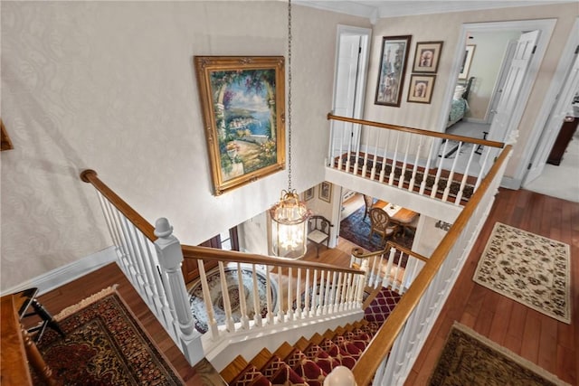 138 Presnar Dr, Neshannock Twp, PA 16105 - stairway featuring hardwood / wood-style flooring, ornamental molding, a chandelier, and baseboards