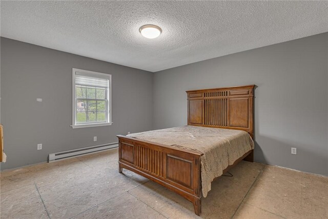 677 Fairlane Blvd, New Galilee, PA 16141 - bedroom with a baseboard heating unit and a textured ceiling