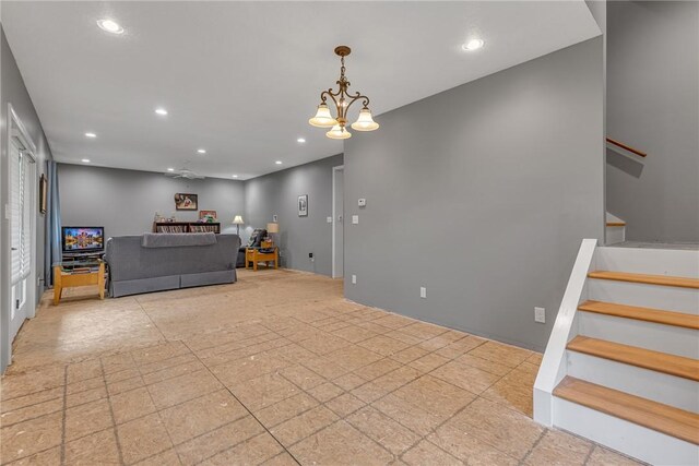 677 Fairlane Blvd, New Galilee, PA 16141 - living room with stairway, recessed lighting, and a chandelier