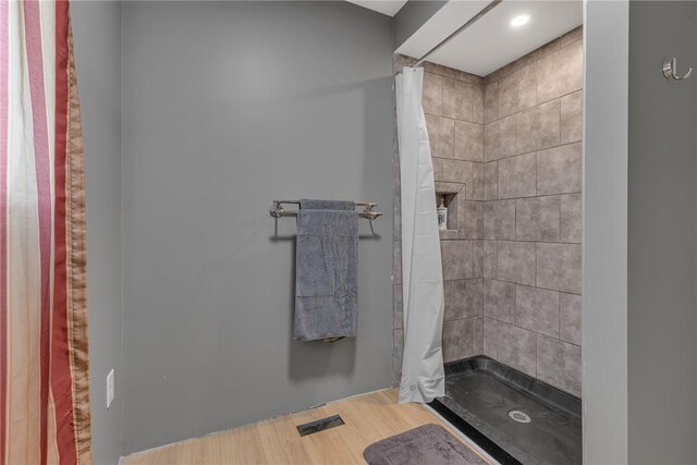 677 Fairlane Blvd, New Galilee, PA 16141 - full bathroom featuring a tile shower and wood finished floors