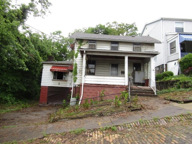 445 4th St, Freedom, PA 15042 - view of front of house featuring a porch