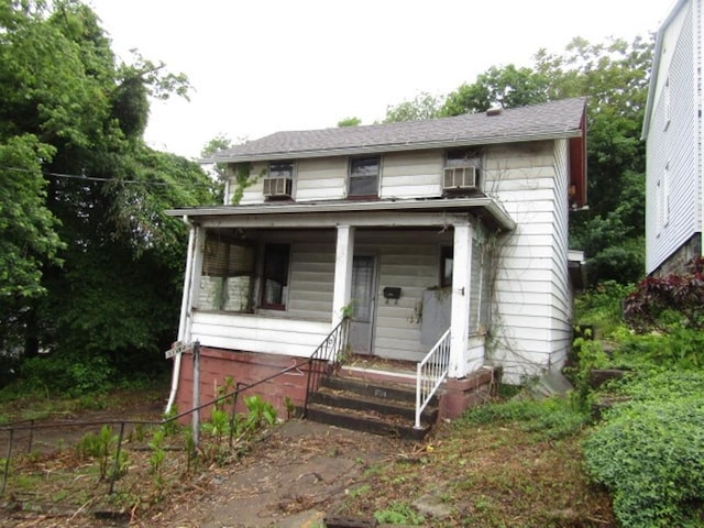 445 4th St, Freedom, PA 15042 - view of front of house featuring a porch
