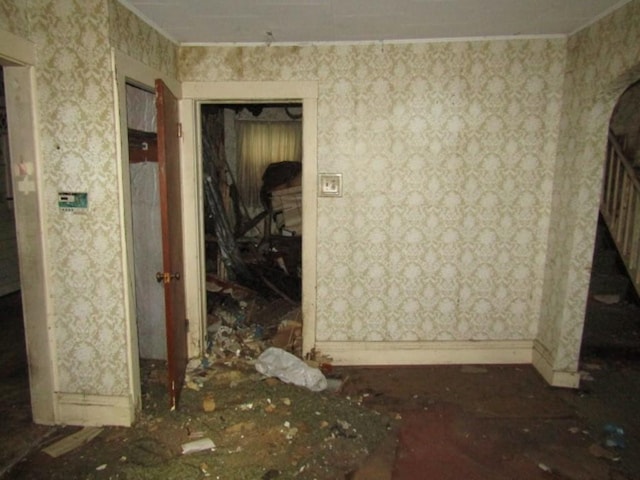 445 4th St, Freedom, PA 15042 - spare room featuring crown molding, wallpapered walls, and baseboards
