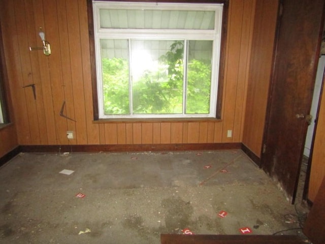 445 4th St, Freedom, PA 15042 - empty room with baseboards and wood walls
