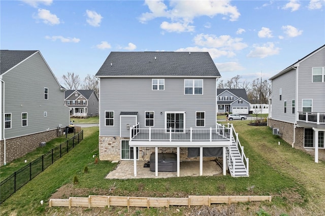 2431 Demare Dr, Bethel Park, PA 15102 - rear view of house featuring a hot tub, a patio area, stairs, a wooden deck, and a residential view