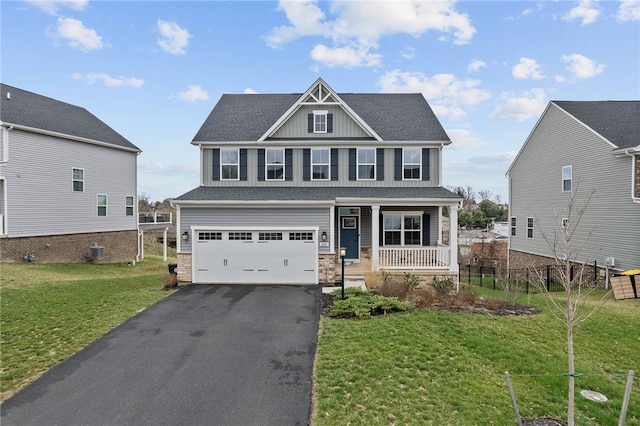 2431 Demare Dr, Bethel Park, PA 15102 - craftsman-style home with covered porch, board and batten siding, driveway, an attached garage, and stone siding