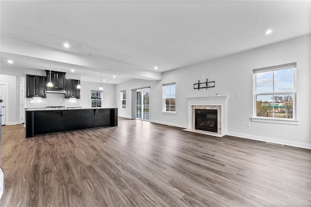 2431 Demare Dr, Bethel Park, PA 15102 - unfurnished living room with recessed lighting, dark wood-type flooring, a premium fireplace, and baseboards