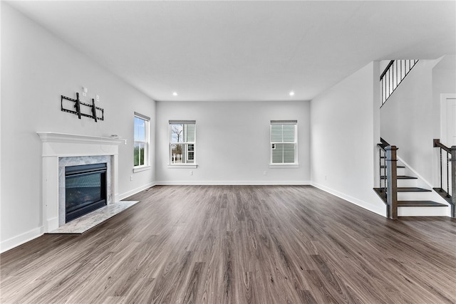 2431 Demare Dr, Bethel Park, PA 15102 - unfurnished living room featuring stairs, dark wood finished floors, a fireplace, baseboards, and recessed lighting