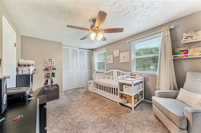 3095 Camberly Dr, Hampton, PA 15044 - carpeted bedroom featuring a textured ceiling, a closet, and a ceiling fan