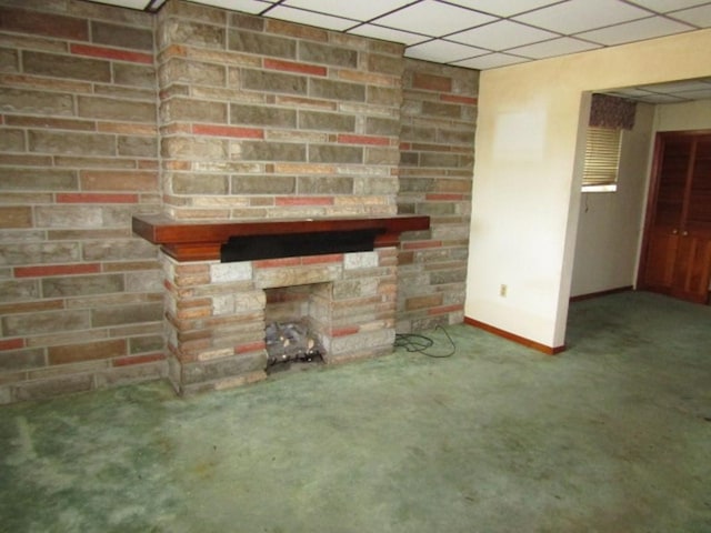 1214 1/2 3rd St, Mckees Rocks, PA 15136 - unfurnished living room featuring baseboards, a fireplace, carpet, and a paneled ceiling