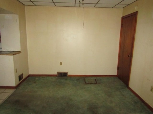 1214 1/2 3rd St, Mckees Rocks, PA 15136 - unfurnished room featuring a paneled ceiling, baseboards, and light carpet