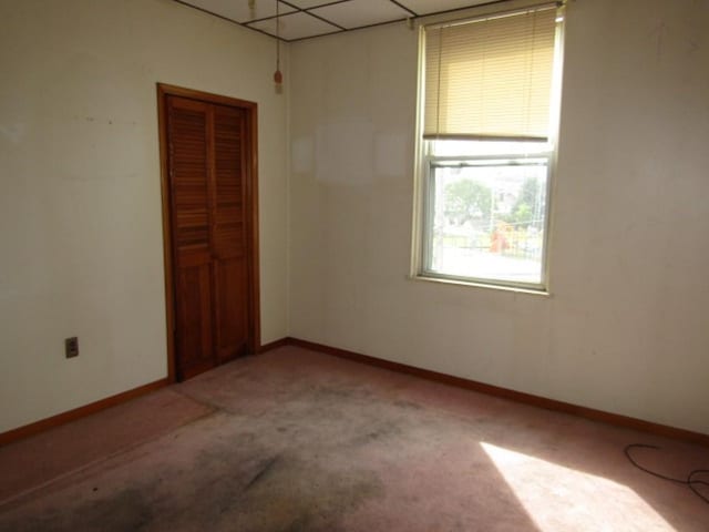 1214 1/2 3rd St, Mckees Rocks, PA 15136 - unfurnished room featuring carpet floors and baseboards