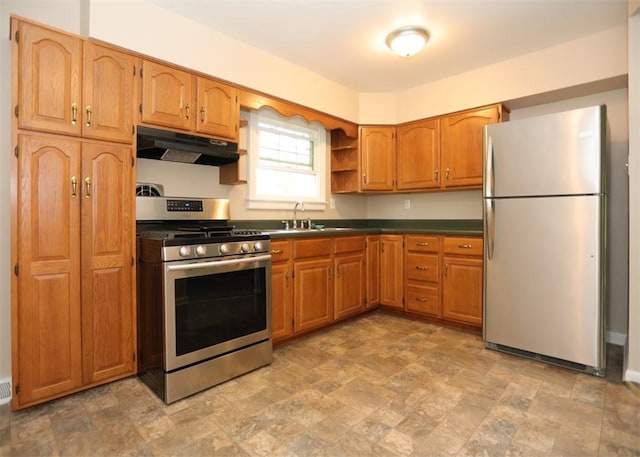 1107 Croxall Ave, Hopewell Twp Bea, PA 15001 - kitchen with stainless steel appliances, under cabinet range hood, stone finish floors, dark countertops, and brown cabinetry
